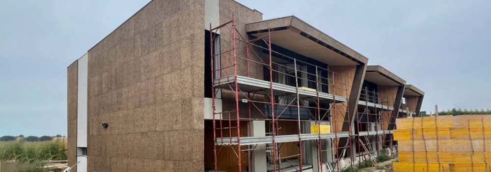 Edificio trifamiliare in xlam e sughero faccia a vista a Mulazzano certificato CasaClima nature