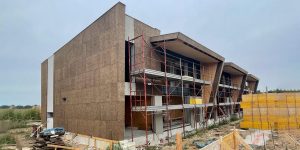 Edificio trifamiliare in xlam e sughero faccia a vista a Mulazzano certificato CasaClima nature